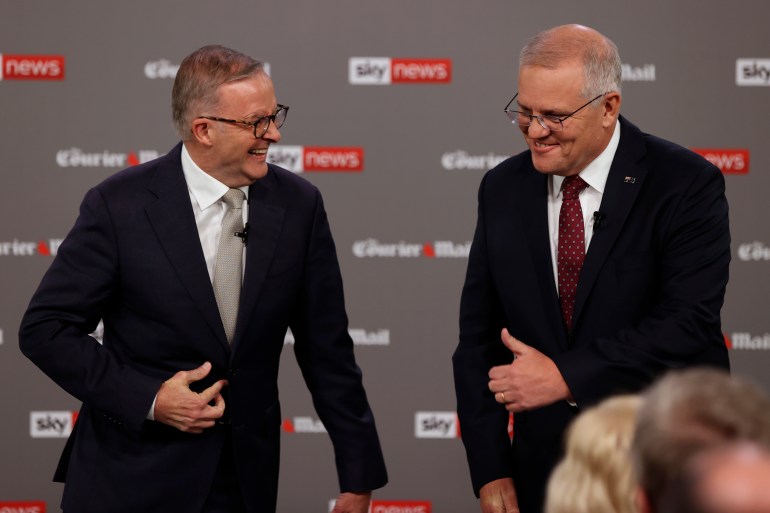 Anthony Albanese and Scott Morrison share the stage at an election debate