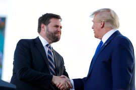 US Senate candidate JD Vance, left, greets former President Donald Trump at a rally at the Delaware County Fairgrounds in Delaware, Ohio.