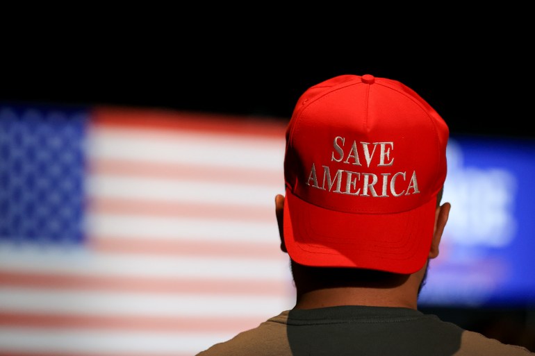 A supporter wears a 'Save America' hat during an election night watch party in Ohio, US