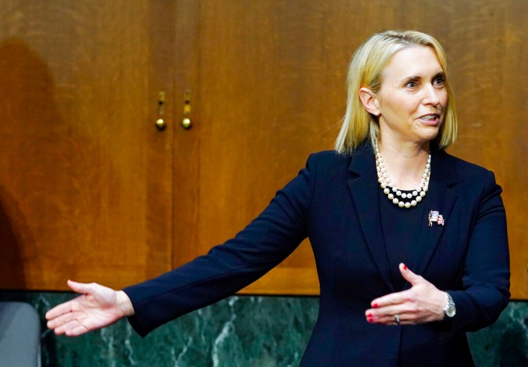 Bridget Brink, nominated to be U.S Ambassador to Ukraine, talks before she testifies before a Senate Foreign Relations Committee confirmation hearing.