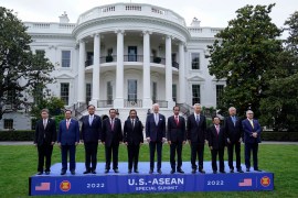 The eight ASEAN leaders stand with US President Joe Biden for a formal photograph with the White House behind them