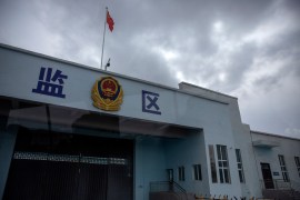 A Chinese national flag flies over a vehicle entrance to the inmate detention area at the Urumqi No 3 Detention Center.