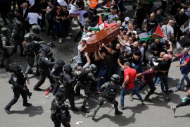 Israeli police confront with mourners as they carry the casket of slain Al Jazeera veteran journalist Shireen Abu Akleh during her funeral in east Jerusalem [Maya Levin/AP Photo]
