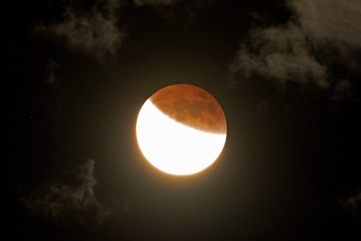 The moon is shown emerging from a full lunar eclipse, Sunday, May 15, 2022, near Moscow, Idaho
