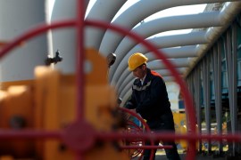 A Ukrainian worker operates valves in a gas storage point in Bil 'che-Volicko-Ugerske underground gas storage facilities in Strij, outside Lviv, Ukraine