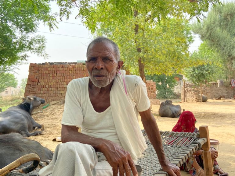 Farmer Matadin Meena on a charpoy in his house in Rajasthan, India