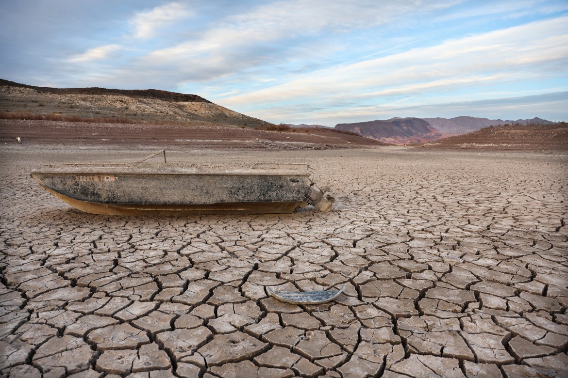 A formerly sunken boat rests on a now-dry section of lakebed at the drought-stricken Lake Mead, Nevada