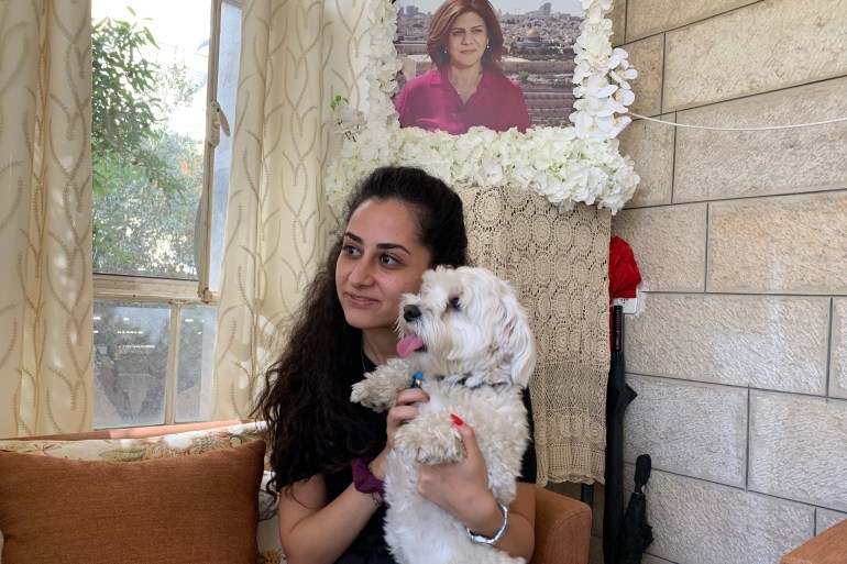 Lina Abu Akleh and Shireen's dog Filfil