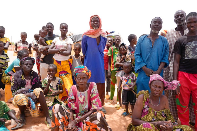 Internally displaced people wait for aid in Djibo, Burkina Faso