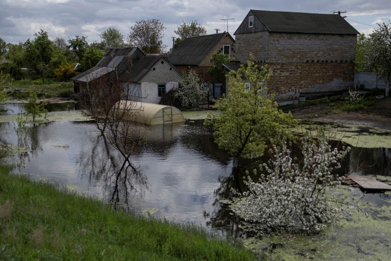 A house flooded after Ukrainian military forces opened a dam to flood a residential area in order to stop advance of Russian forces towards Kyiv