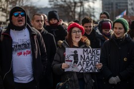 People take part in a counterprotest against a neo-Nazi march in Dresden, Germany