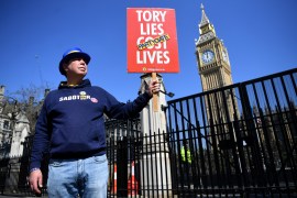 Anti-government campaigner Steve Bray protests against &#39;partygate&#39; outside Parliament in London [Andy Rain/EPA]