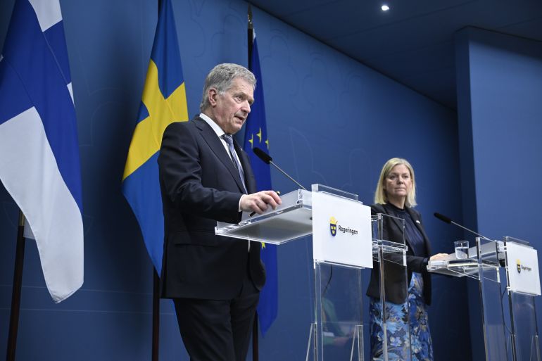 Finland's President Sauli Niinisto (L) and Sweden's Prime Minister Magdalena Andersson attend a joint news conference in Stockholm, Sweden, 17 May 2022.