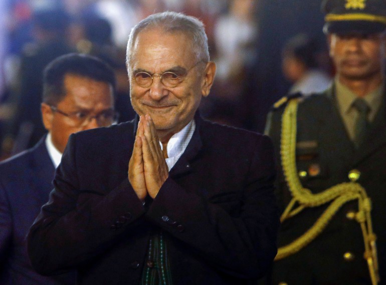 Timor Leste's President Jose Ramos Horta puts his hands together to acknowledge the crowd at his inauguration
