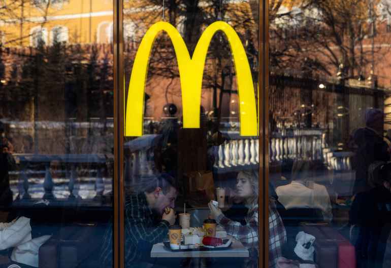 People eat in a McDonald's restaurant near Kremlin in central Moscow, Russia