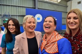 Sinn Fein deputy leader Michelle O'Neill (centre left), party leader Mary Louise McDonald (centre right) and party candidates Emma Sheerin (left) and Linda Dillon (right) celebrate, after Sinn Fein were voted as the largest party in Northern Ireland on May 7, 2022 [Clodagh Kilcoyne/Reuters]