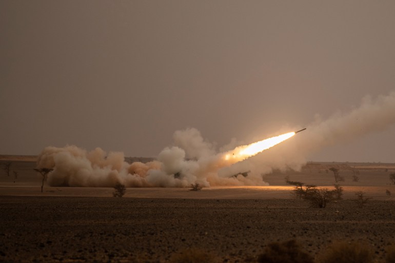 A launch truck fires the High Mobility Artillery Rocket System (HIMARS) at its intended target during the African Lion military exercise in Grier Labouihi complex, southern Morocco, Wednesday, June 9, 202