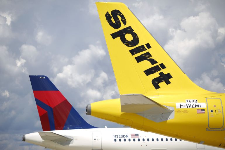 Airbus SE A321 planes with a livery for Delta Air Lines Inc., left, and Spirit Airlines Inc. are seen at the Airbus Final Assembly Line facility in Mobile, Alabama, U.S