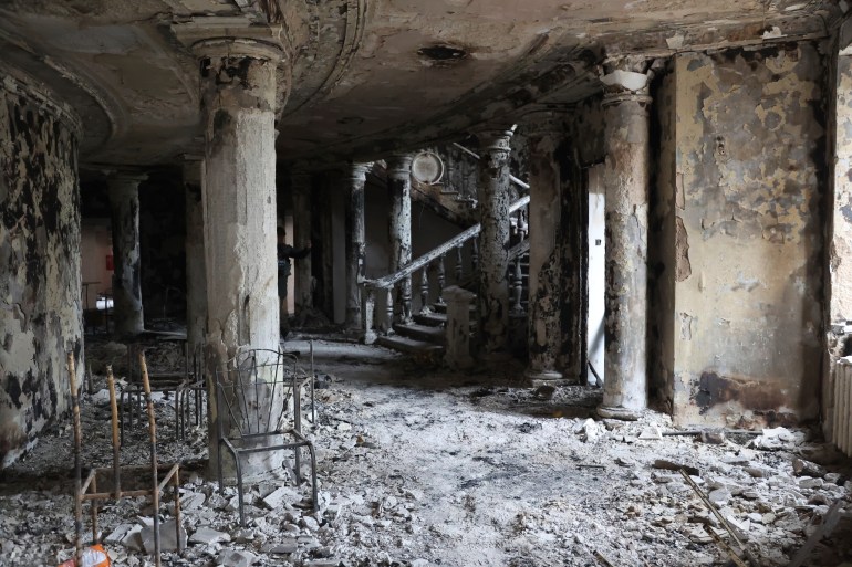 Debris covers the inside of the Donetsk Academic Regional Drama Theatre in Mariupol, Ukraine.