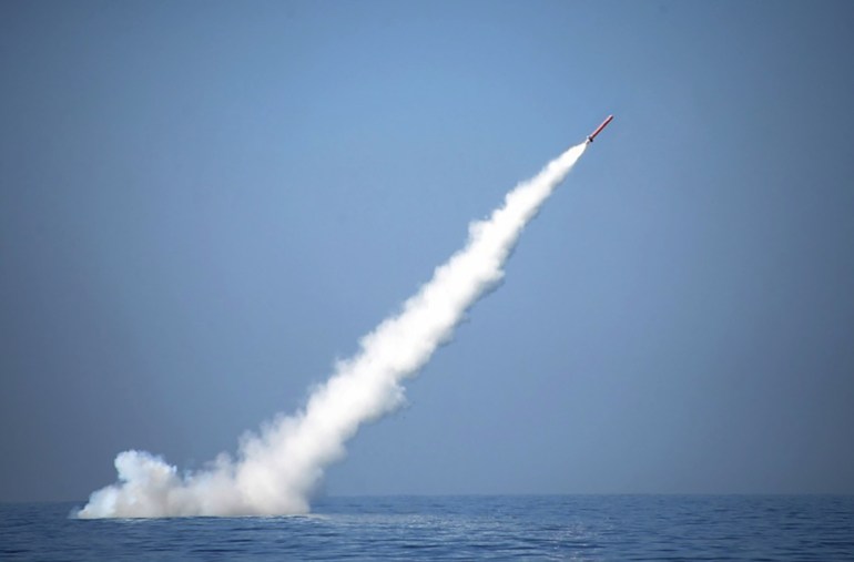 A nuclear-capable cruise missile is launched from a submarine during a test firing at an undisclosed location in Pakistan.