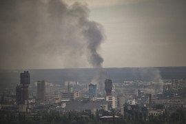 Smoke rises from the city of Severodonetsk in the eastern Ukrainian region of Donbas [File: Aris Messinis/AFP]