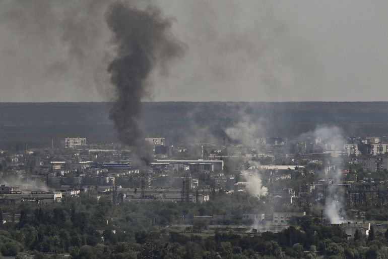 Smoke and dirt rise from the city of Severodonetsk, Ukraine.
