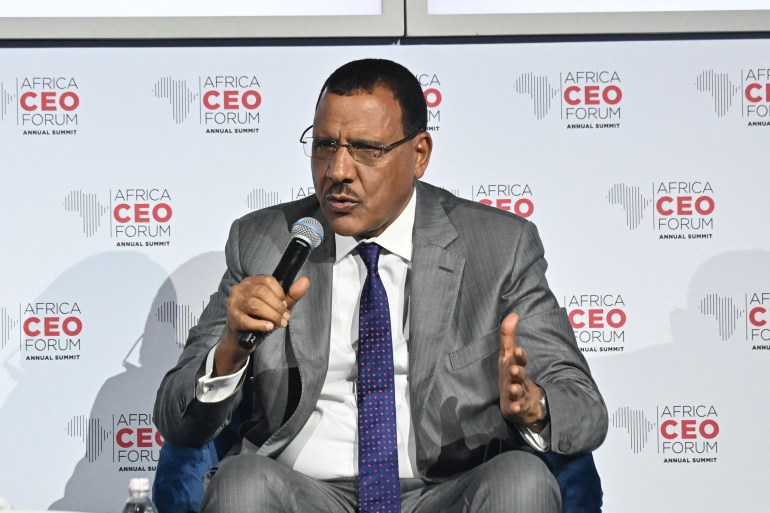 Nigerien President Mohamed Bazoum gestures during a session at the Africa CEO Forum in Abidjan on June 14, 2022. (Photo by Issouf SANOGO / AFP) / The erroneous mention[s] appearing in the metadata of this photo by Issouf SANOGO has been modified in AFP systems in the following manner: [---] instead of [---]. Please immediately remove the erroneous mention[s] from all your online services and delete it (them) from your servers. If you have been authorized by AFP to distribute it (them) to third parties, please ensure that the same actions are carried out by them. Failure to promptly comply with these instructions will entail liability on your part for any continued or post notification usage. Therefore we thank you very much for all your attention and prompt action. We are sorry for the inconvenience this notification may cause and remain at your disposal for any further information you may require.