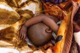 A baby sleeps at the Tudikolela hospital, that is a beneficiary of the NGO ACF (Action contre la faim), in the community of Lipemba, Democratic Republic of Congo.