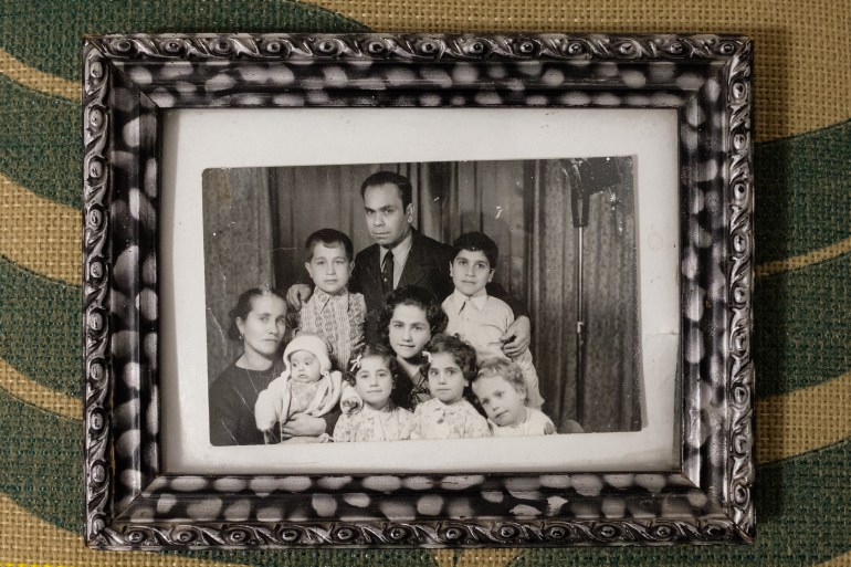 Portrait of Amaline and Wadih Ramia with their seven children