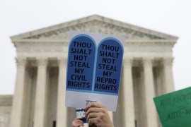 a protester outside the US Supreme Court