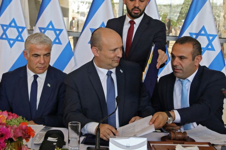 Israeli Foreign Minister Yair Lapid, Prime Minister Nafrali Bennet and politician and Knesset member Abir Kara, attend a weekly cabinet meeting in Jerusalem