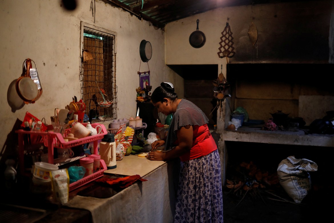 Lasanda Deepthi prepares breakfast in the kitchen at home in Gonapola town, on the outskirts of Colombo