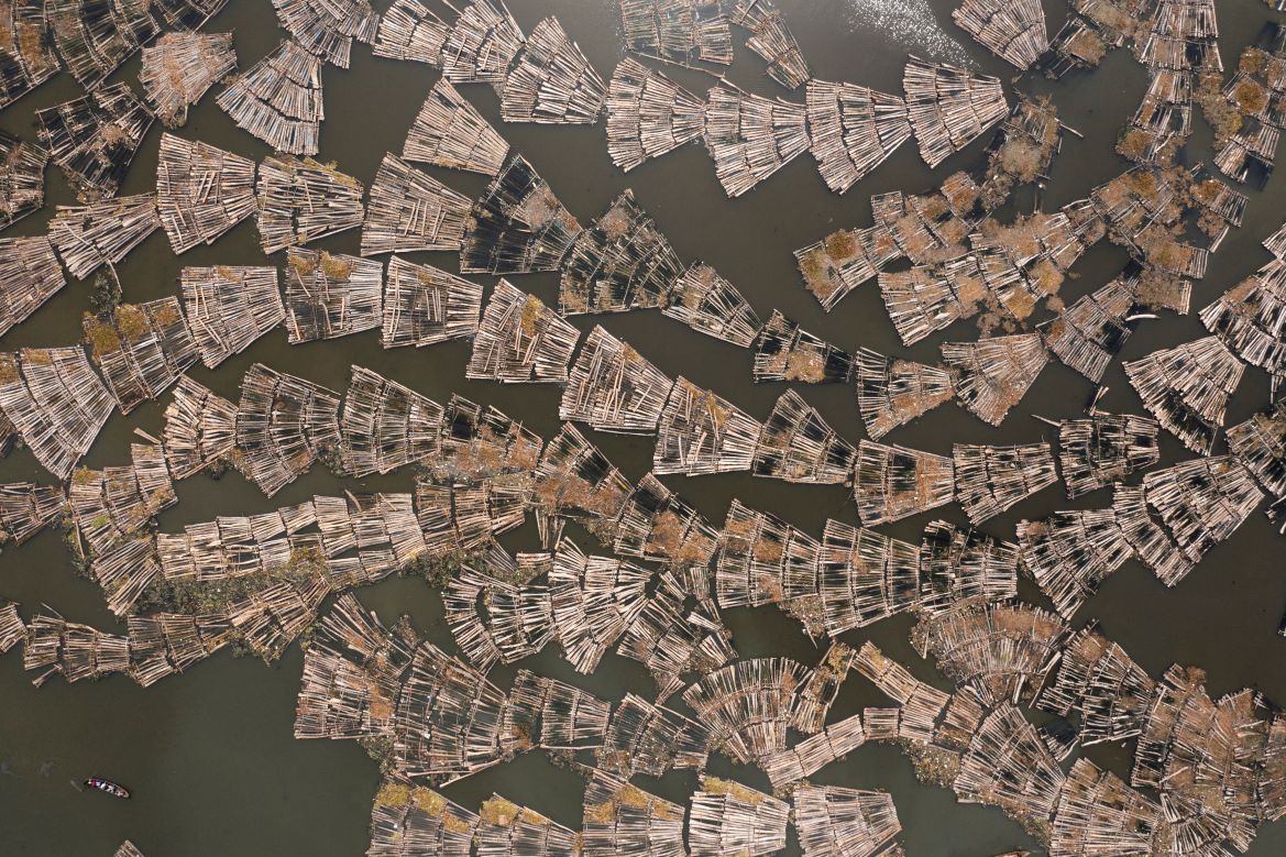 Rafts made of logs transported from Ondo state and other parts of the country are seen gathered in the Lagos lagoon, near the Ebute Metta sawmill in Lagos