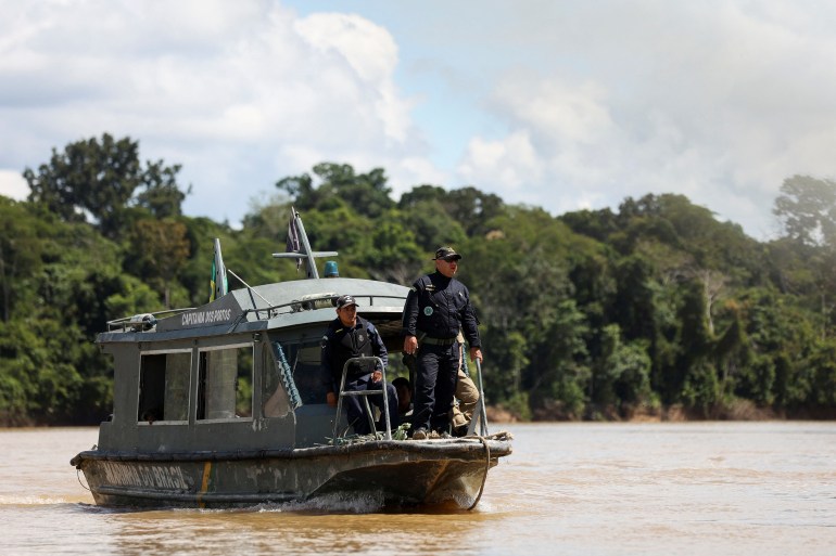 Brazilian Navy members conduct a search operation for British journalist Dom Phillips and indigenous expert Bruno Pereira, who went missing while reporting in a remote and lawless part of the Amazon rainforest, near the border with Peru, in Atalaia do Norte, Amazonas state, Brazil June 14,