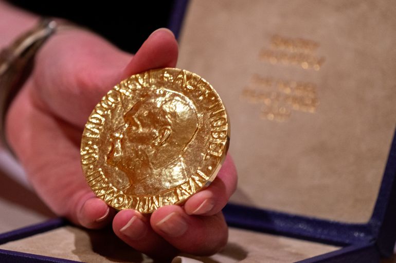 Dmitry Muratov's solid gold Nobel Peace Prize medal