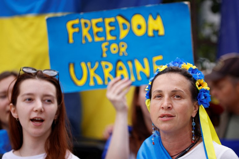 Ukrainians living in Belgium protest in front of the European Council building