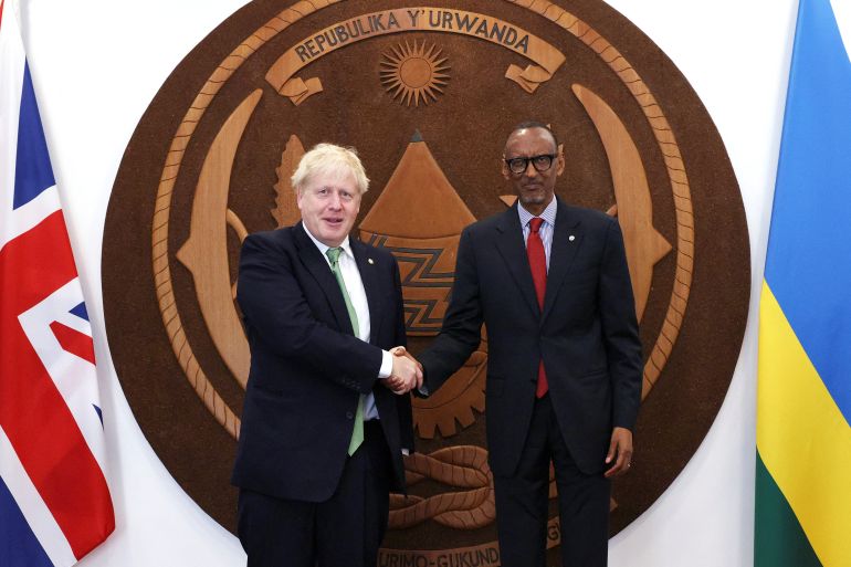 British Prime Minister Boris Johnson shakes hands with Rwandan President Paul Kagame during a bilateral meeting on the sidelines of the Commonwealth Heads of Government Meeting (CHOGM) at the office of the President in Kigali, Rwanda