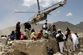 A Taliban helicopter takes off after bringing aid to the site of an earthquake in Gayan, Afghanistan
