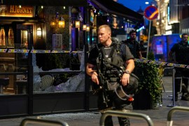 Heavily armed police equipped with bulletproof vests and helmets were patrolling the scene of the shootings in central Oslo [Javad Parsa/NTB/via Reuters]