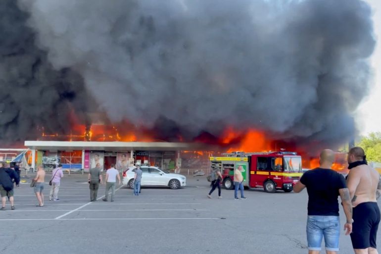 A shopping mall hit by a Russian missile strike in Kremenchuk, Ukraine on June 27, 2022 [Telegram/V_Zelenskyy_official/Reuters]