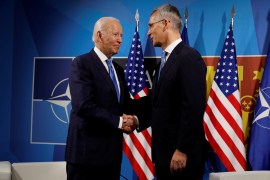 NATO Secretary General Jens Stoltenberg greets US President Joe Biden as he arrives at the start of the NATO summit in Madrid, Spain. [Jonathan Ernst/Reuters]