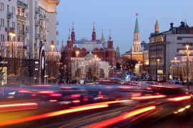 Light trails from heavy traffic on Tverskaya Street by the State Historical Museum in Moscow, Russia