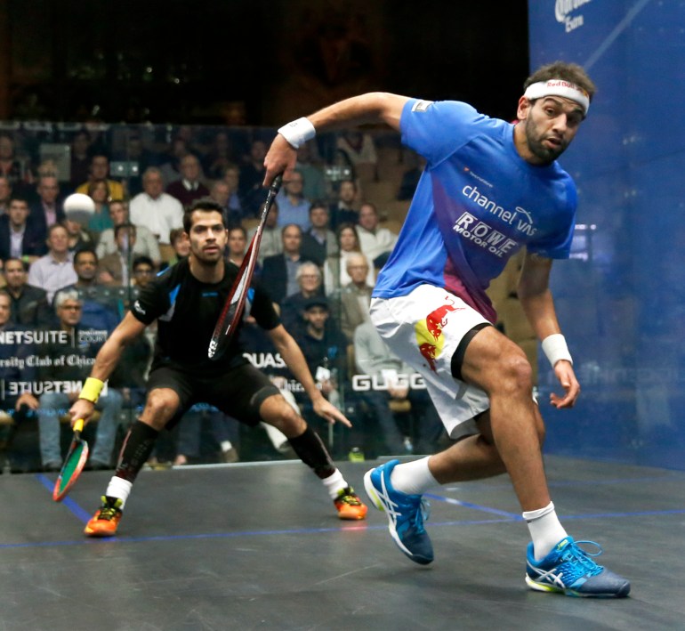 Mohamed Elshorbagy, right, competes against Cesar Salazar, from Mexico, in 2017 [File photo: Charles Rex Arbogast/AP]