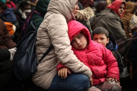 Migrants gather between Pazarkule border gate, Edirne, Turkey, and Kastanies border gate, Evros region