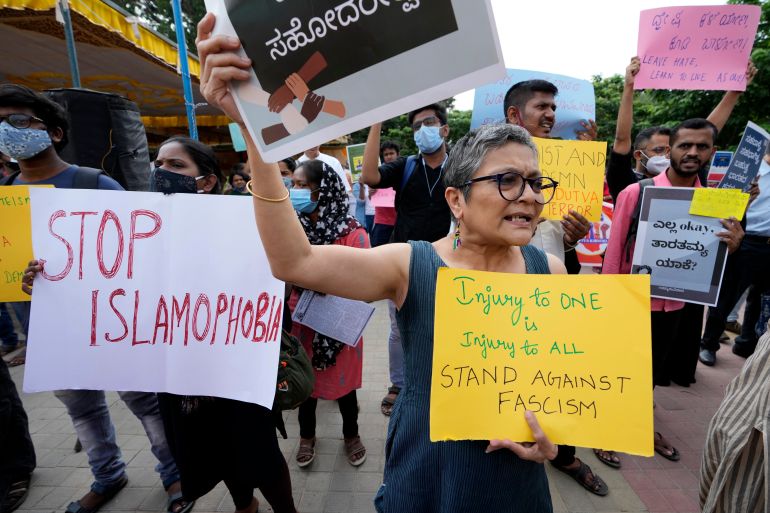 A protest in Bengaluru, India on Saturday, April 30, 2022 to promote communal harmony and denounce Islamophobia in the wake of recent communal violence in India [Aijaz Rahi/AP]