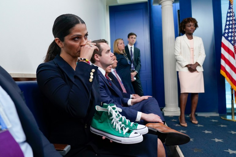 Camila Alves McConaughey holds the green Converse shoes that were worn by Uvalde shooting victim Maite Yuleana Rodriguez