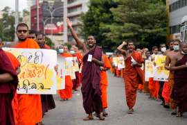 Sri Lankan student Buddhist monks shout slogans