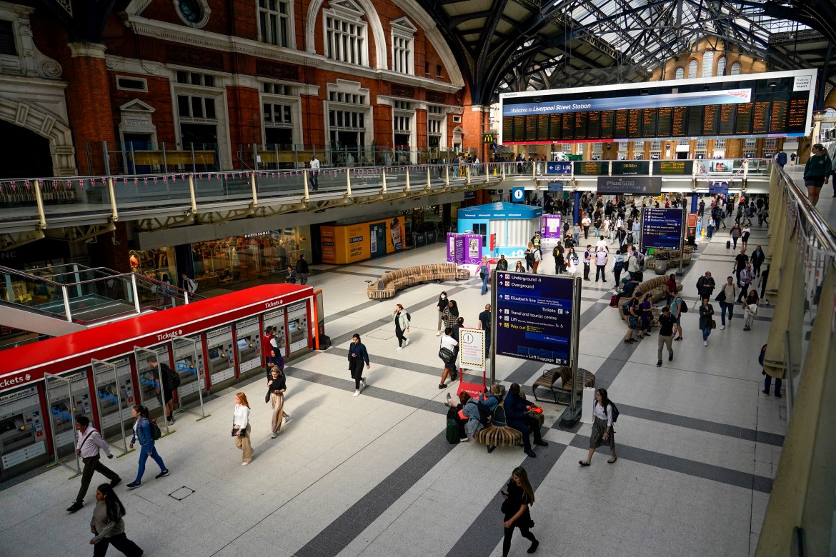 A near empty Liverpool Street station, in London, Tuesday, June 21, 2022. Britain's biggest rail strike in decades went ahead Tuesday after last-minute talks between a union and train companies failed to reach a settlement over pay and job security. Up to 40,000 cleaners, signalers, maintenance workers and station staff are due to walk out for three days this week, on Tuesday, Thursday and Saturday. (AP Photo/Alberto Pezzali)