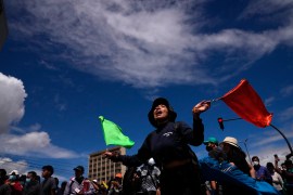 A students joins Indigenous women in a rally to show support for protests and a national strike against the government of President Lasso, in Quito, Ecuador, June 25 [Dolores Ochoa/ AP]