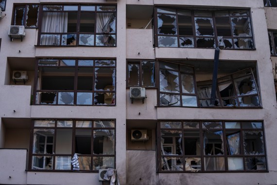 Damage at the scene of a residential building following explosions in Kyiv